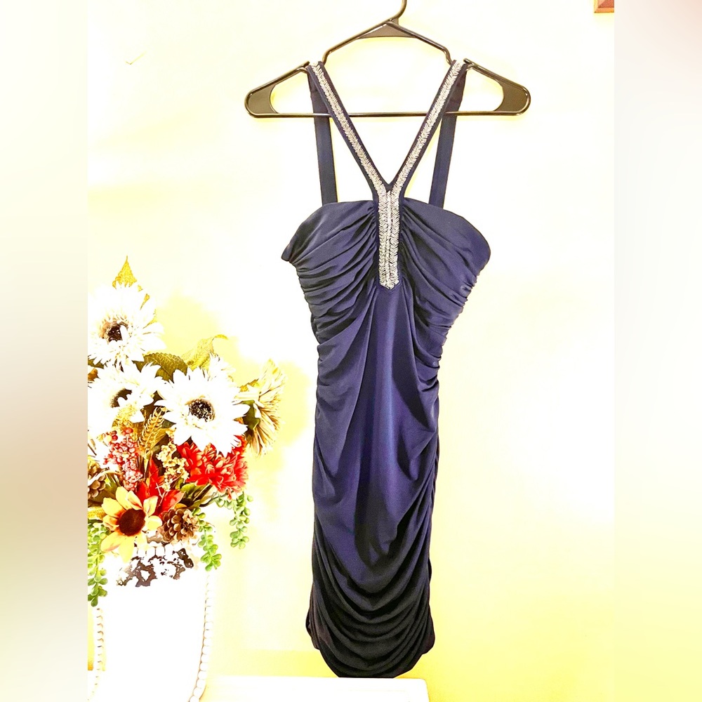 Form fitting , Formal dress, navy blue, sized medium but can be size small